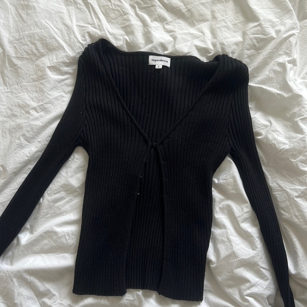 NWT Superdown black cardigan with hook and eyelet closure. Ribbed knit material.